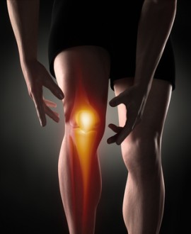 Man knee pain concept Alpha-Stim for pain